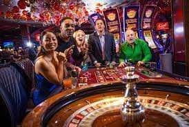 Baccarat dealer preparing cards at live table